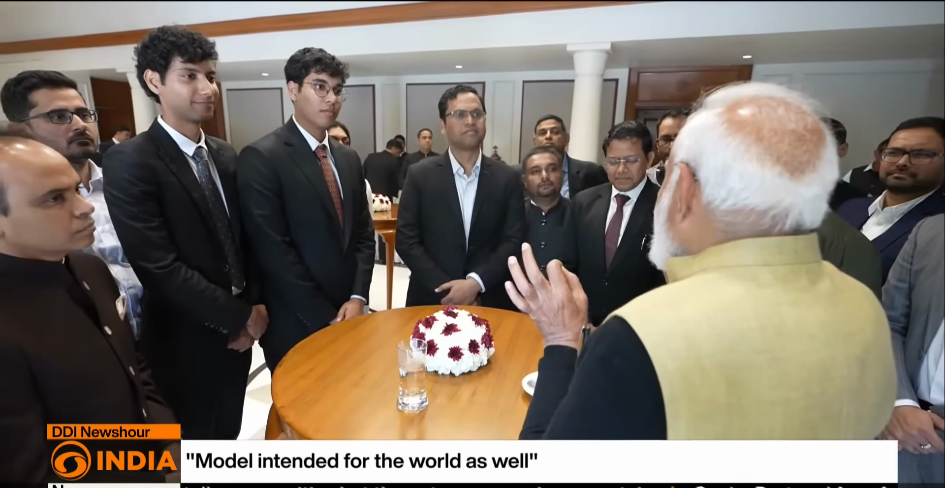 Parth and Suvrat with the Hon. Prime Minister, from DD India's coverage: “Model intended for the world as well”